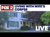 Metro Detroit man accused of living with wife's corpse