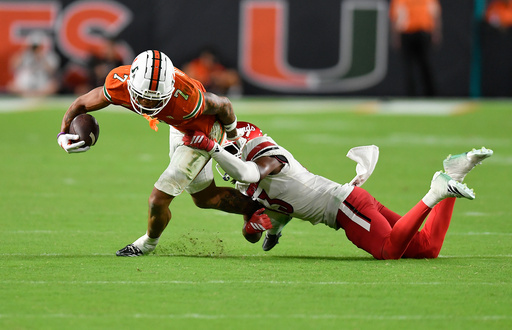 The Latest: Big waves are coming for the top 10 of the AP Top 25