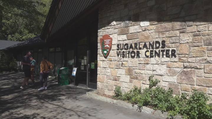 Visitors react to the first day of the government shutdown at GSMNP