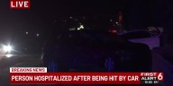 Person hospitalized after being hit by car