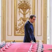 French PM backs suspending pensions reform in key move for survival