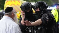 One of two victims in UK synagogue attack may have been killed by a bullet fired by police