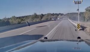 CAUGHT ON CAMERA: ‘Alert’ motorists avert tragedy when tires fly off semi truck
