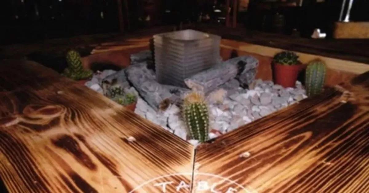 Schoolboy, 10, engulfed in flames after waitress pours liquid fuel into fire pit