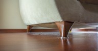 The key to cleaning under heavy furniture depends on one thing