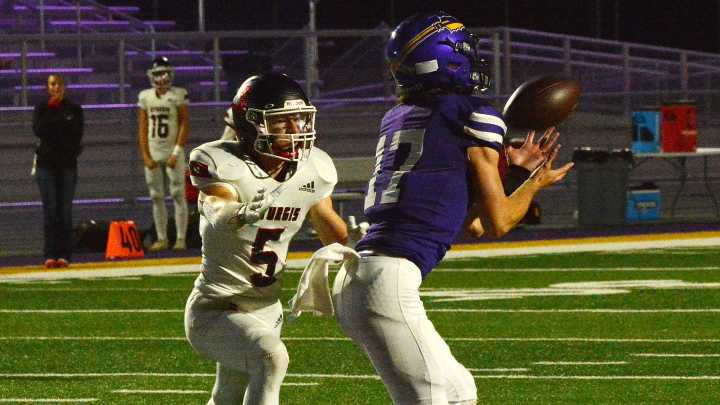 Watertown quarterback Markus Pitkin proves he's a triple threat