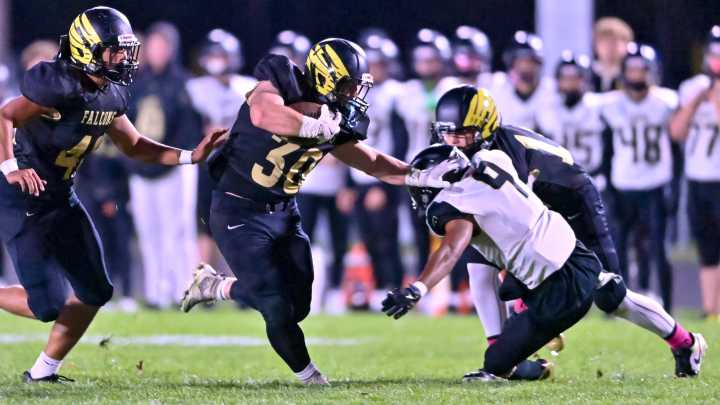 Our best photos as Winchester football hosts Lapel in IHSAA sectional