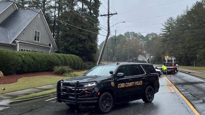 Portion of busy Cobb road closes after damage to power pole