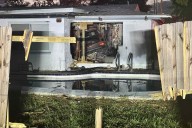 4 Injured After SUV Flies Over Pool and Crashes into Home