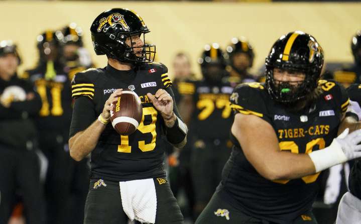 Mitchell throws two TD passes as Ticats down Redblacks 35