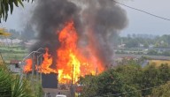 Violento incendio en La Cruz deja a voluntario lesionado y obliga a solicitar refuerzos a ciudades vecinas