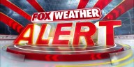 Plane crashes onto Massachusetts highway as powerful nor'easter lashes Northeast