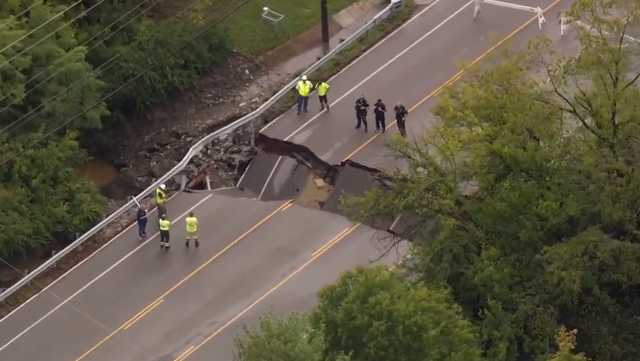 PHOTOS: Entire road collapses due to flooding near Louisville area