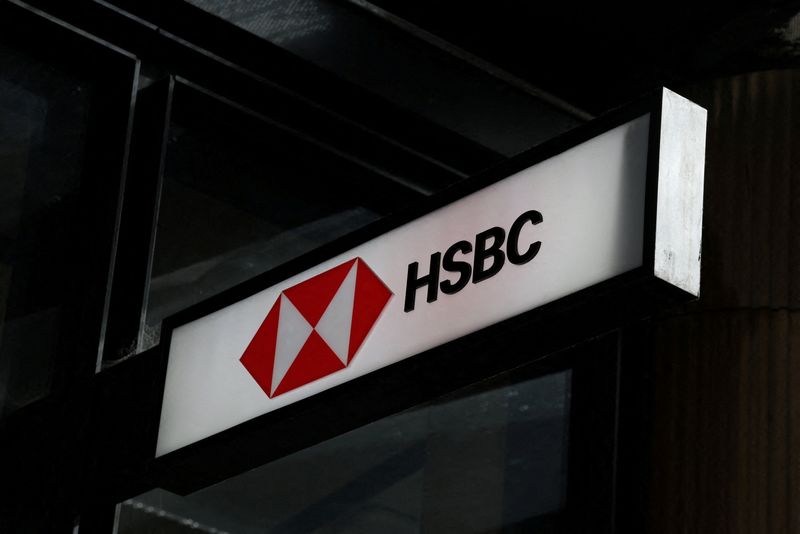 HSBC third-quarter profit slides 14% on legal charges but lifts income outlook