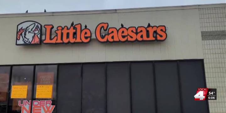 Closed signs appear at Little Caesars in central Nebraska