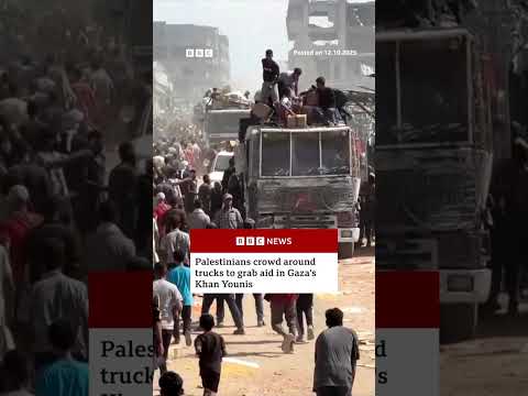 Palestinians crowd around trucks to grab aid in Gaza's Khan Younis. #BBCNews