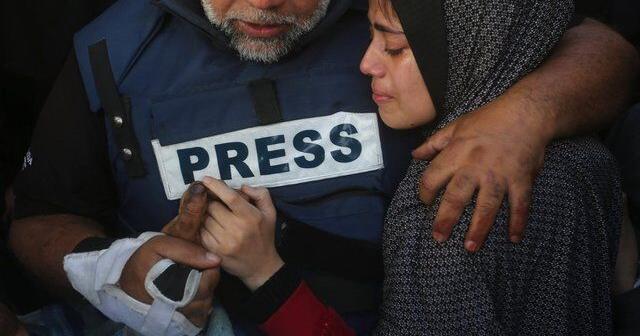 Journalists work in dire conditions to tell Gaza's story, knowing that could make them targets