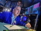 Wall Street veers upward after Trump softens his criticism of China
