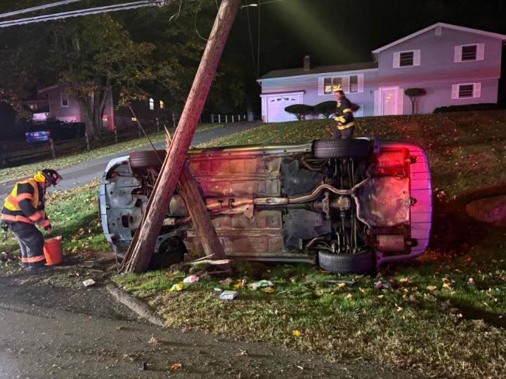Injuries reported after car strikes utility pole in North Haven rollover crash