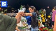 Locals swarm when air freight carrying fresh food arrives on the island