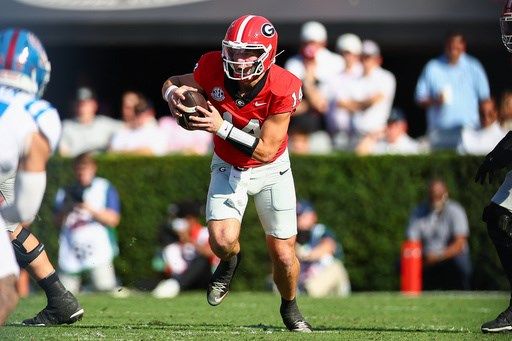 Stockton throws 4 TD passes as No. 9 Georgia rallies in 4th quarter to beat No. 5 Ole Miss 43