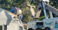 Metro Police investigating after a vehicle crashed into roof of someones home over the weekend