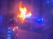 Roving street party takes over Mass. and Tremont; cruiser set ablaze, two arrested