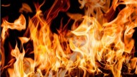 Private school bus caughts fire at Mailardevpally