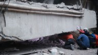 At least 91 students remain buried in rubble 2 days after school collapse in Indonesia