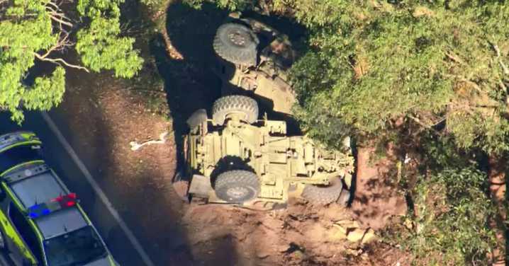 Ferny Hills crash: Woman hospitalised after car collides with army truck near Brisbane