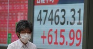 Asian shares swing higher after a wobbly day on Wall Street