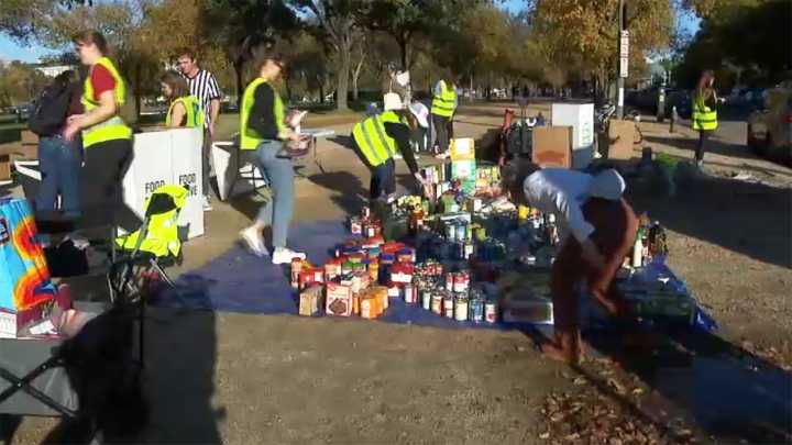 Fired and furloughed federal workers hold food drive outside USDA