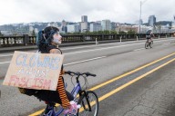 PHOTOS: Cyclists protest federal troops in Portland with Naked Bike Ride
