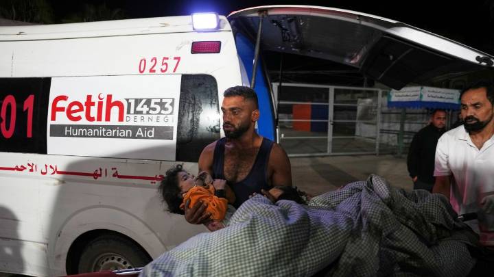 Israel's military says ceasefire is back on as death toll from overnight strikes in Gaza reaches 104