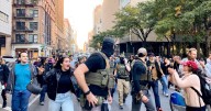 Immigration agents conducting sweep on NYC's famed Canal Street confronted by protesters