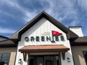 New golf lounge Greenies brings year-round tee time to Clay