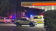 Bloodied man dumped at Western Sydney petrol station after late