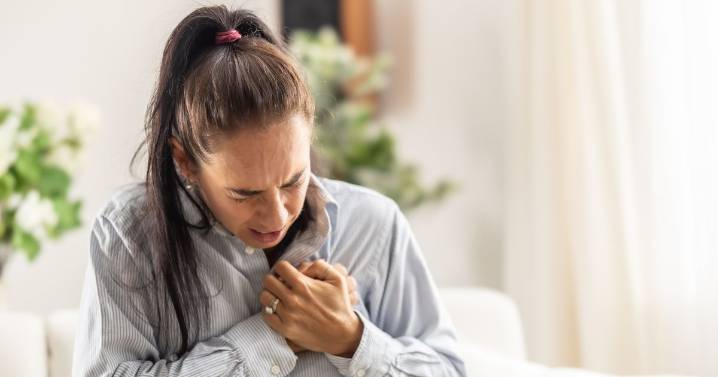Symptom when you breathe could indicate Covid rather than flu amid NHS warning