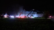 'Shock and awe': Crews say man emerges from massive structure fire after an hour on scene