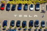 Tesla reports record quarterly revenue as buyers driven by EV tax credit expiry