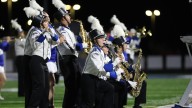 Photos of the Dundee and Ida bands during their rivalry football game