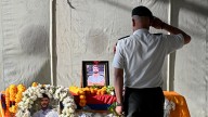 Hamas transfers deceased hostage's coffin to Red Cross officials in Gaza