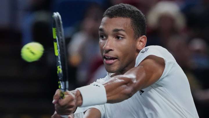 Auger-Aliassime keeps ATP Finals hopes alive with first