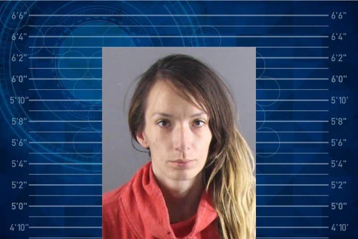 Woman arrested after allegedly hijacking vehicle with needle, male suspect at