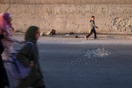 Syrian students return to schools stripped bare by conflict