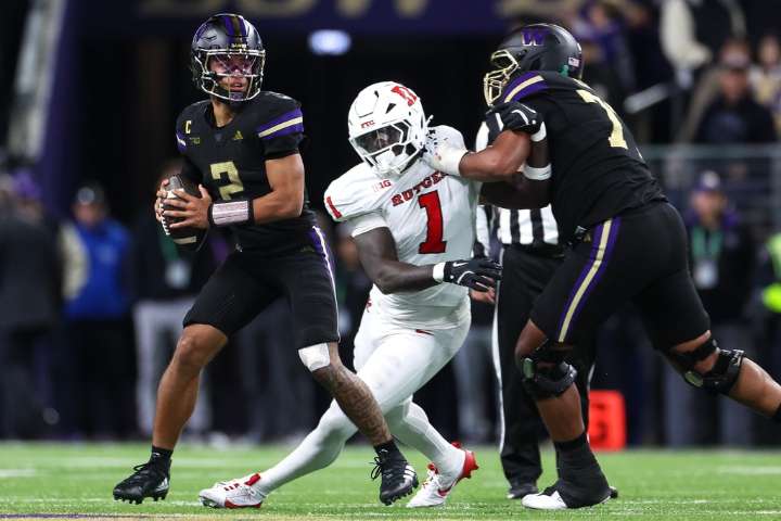 Williams Jr. has career highs in passing, rushing to lead Washington over Rutgers 38