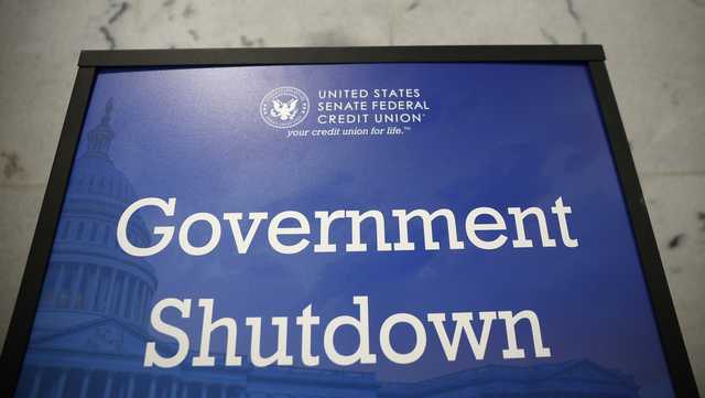 Judge temporarily blocks Trump from firing workers during shutdown