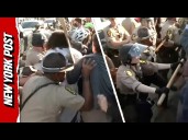 Scuffles and Arrests Outside Chicago ICE Facility