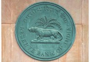 India's forex reserves drop below USD 700 bn