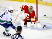 Canucks 8, Flames 1: Elias Pettersson's blast from past overshadows roster battles